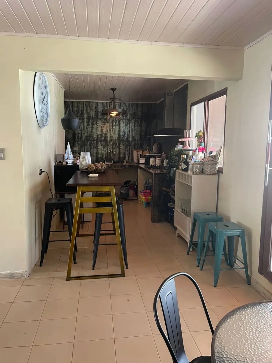 Lote comercial con casa en santa catalina pueblo centee